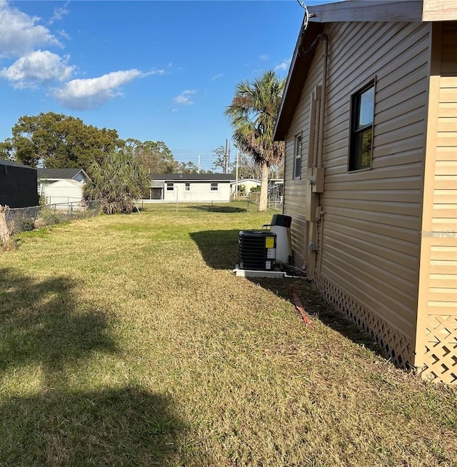 view of yard featuring central AC