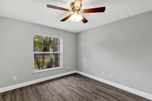 unfurnished room with hardwood / wood-style floors and ceiling fan