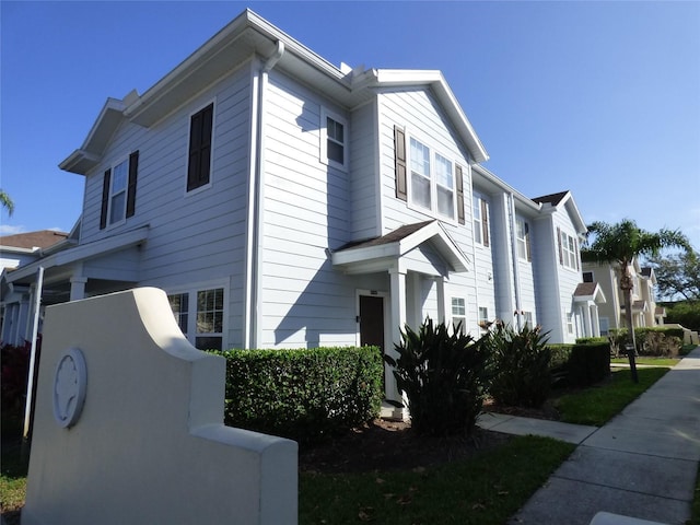 view of property exterior featuring a residential view