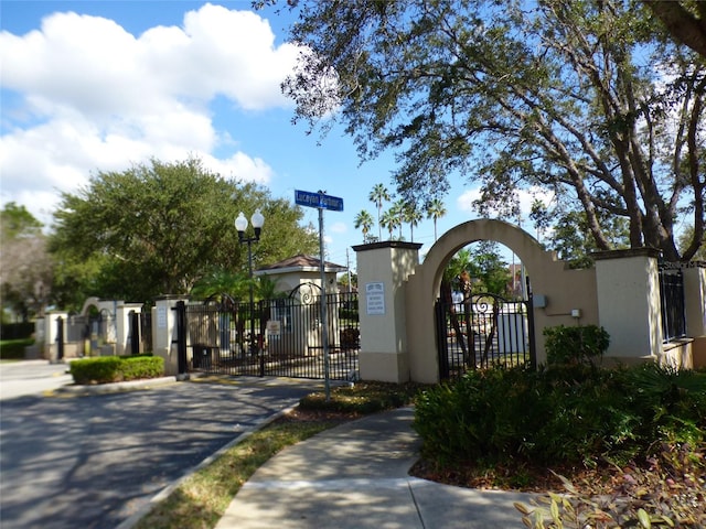 exterior space featuring a gate and fence