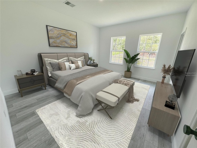 bedroom with light wood-type flooring