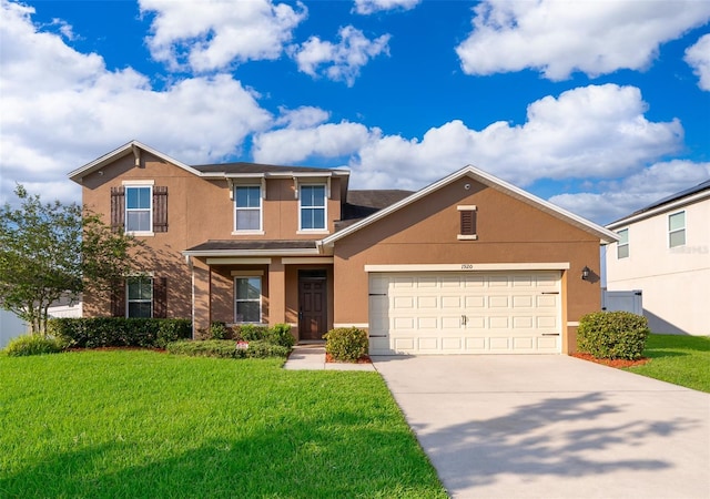 view of front facade with a garage and a front yard