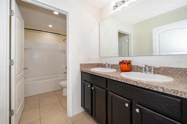 full bathroom featuring vanity,  shower combination, tile patterned floors, and toilet