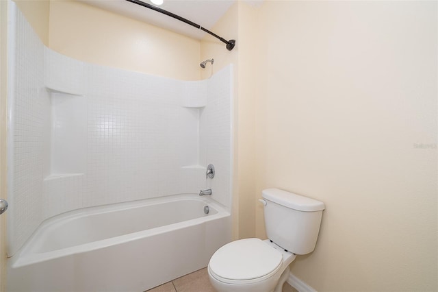 bathroom with toilet, shower / bath combination, and tile patterned flooring