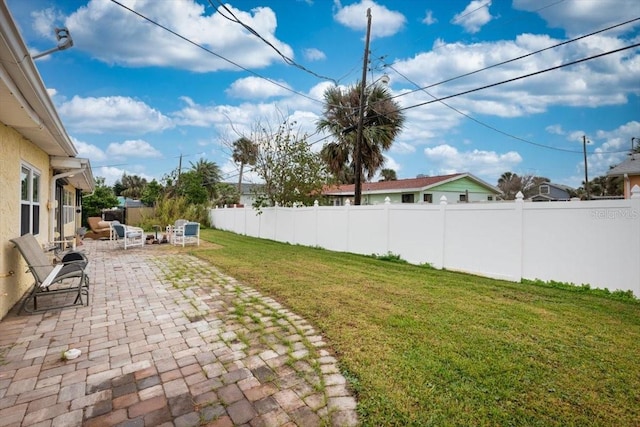 view of yard featuring a fenced backyard and a patio