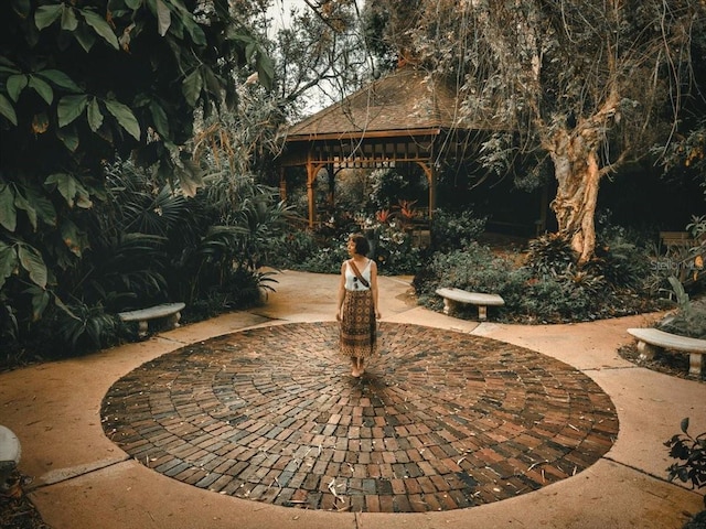 view of community with a patio and a gazebo