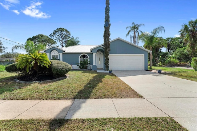 single story home with a garage and a front yard