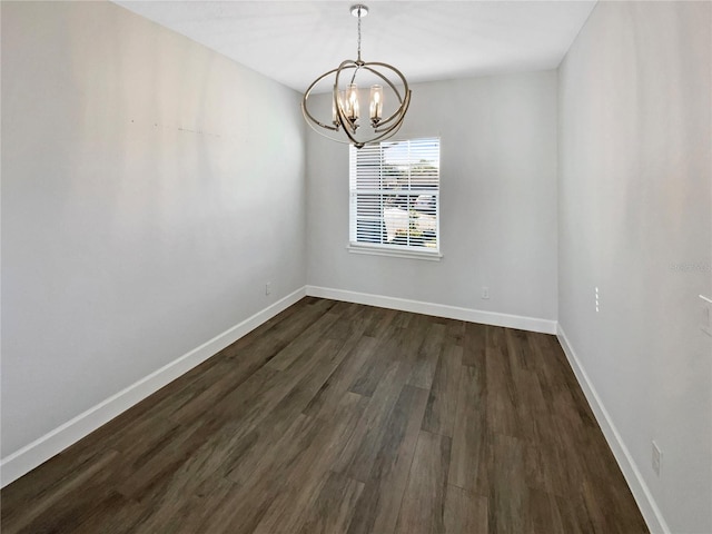 unfurnished dining area with a notable chandelier and dark hardwood / wood-style floors