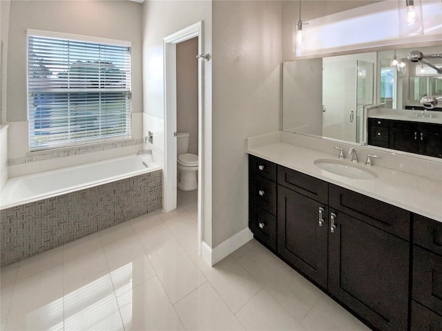 full bathroom featuring vanity, tile patterned flooring, plus walk in shower, and toilet