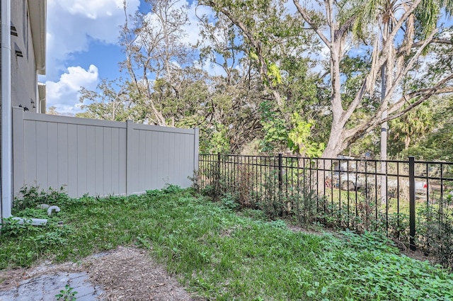 view of yard featuring fence