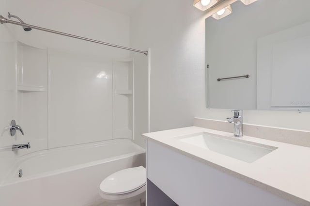 full bathroom with toilet, vanity, and washtub / shower combination