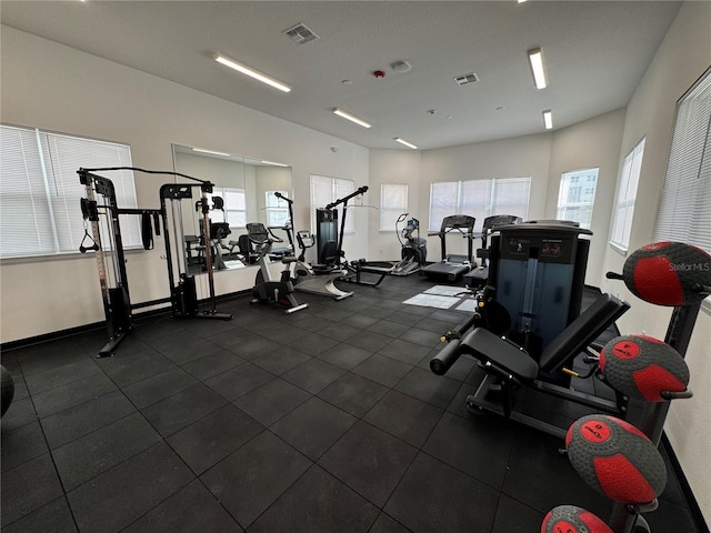 gym with plenty of natural light and visible vents