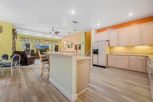 126 Seville Chase Dr, Winter Springs, FL 32708 - kitchen featuring white refrigerator with ice dispenser, open floor plan, light wood-type flooring, recessed lighting, and ceiling fan