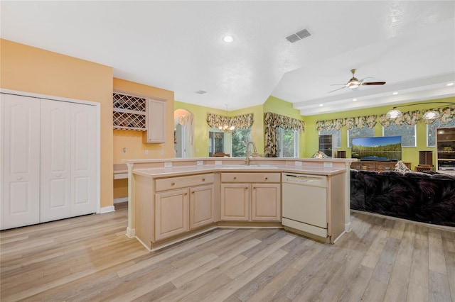 126 Seville Chase Dr, Winter Springs, FL 32708 - kitchen featuring dishwasher, a sink, open floor plan, light countertops, and recessed lighting