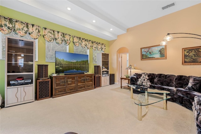 126 Seville Chase Dr, Winter Springs, FL 32708 - carpeted living area featuring arched walkways and recessed lighting