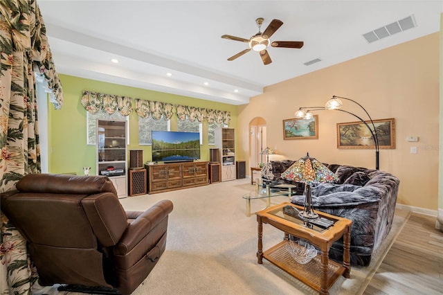 126 Seville Chase Dr, Winter Springs, FL 32708 - living room with arched walkways, recessed lighting, a ceiling fan, and beam ceiling