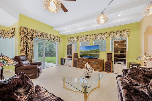 126 Seville Chase Dr, Winter Springs, FL 32708 - living area featuring a ceiling fan, carpet, beam ceiling, arched walkways, and recessed lighting