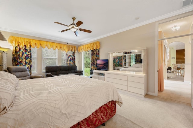126 Seville Chase Dr, Winter Springs, FL 32708 - bedroom with arched walkways, carpet, crown molding, and ceiling fan