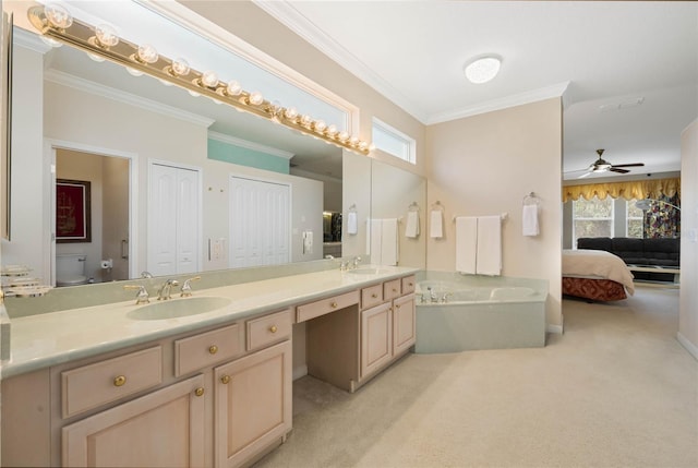 126 Seville Chase Dr, Winter Springs, FL 32708 - full bathroom with double vanity, ornamental molding, a bath, ensuite bathroom, and toilet