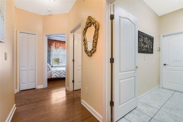 126 Seville Chase Dr, Winter Springs, FL 32708 - hall with baseboards and light wood finished floors