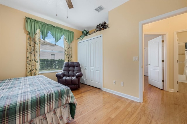 126 Seville Chase Dr, Winter Springs, FL 32708 - bedroom with light wood finished floors, baseboards, a closet, and a ceiling fan