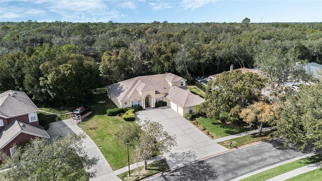 126 Seville Chase Dr, Winter Springs, FL 32708 - view from above of property with a heavily wooded area
