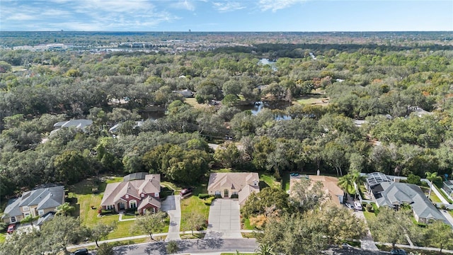 126 Seville Chase Dr, Winter Springs, FL 32708 - aerial overview of property's location featuring a forest and nearby suburban area