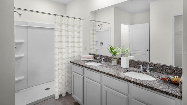 8600 Bridgeport Bay Cir, Mount Dora, FL 32757 - bathroom featuring tile patterned floors, curtained shower, and vanity