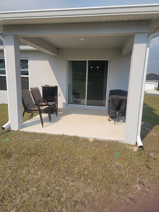 view of patio / terrace with a grill