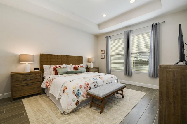 bedroom featuring a tray ceiling