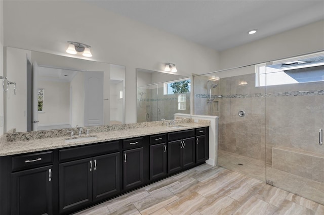 bathroom with vanity and walk in shower