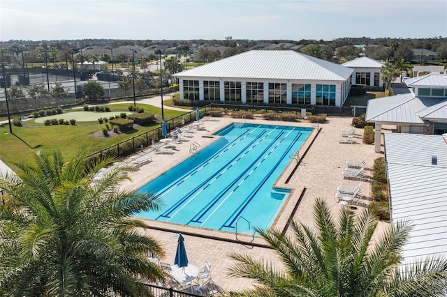 view of swimming pool featuring a patio area