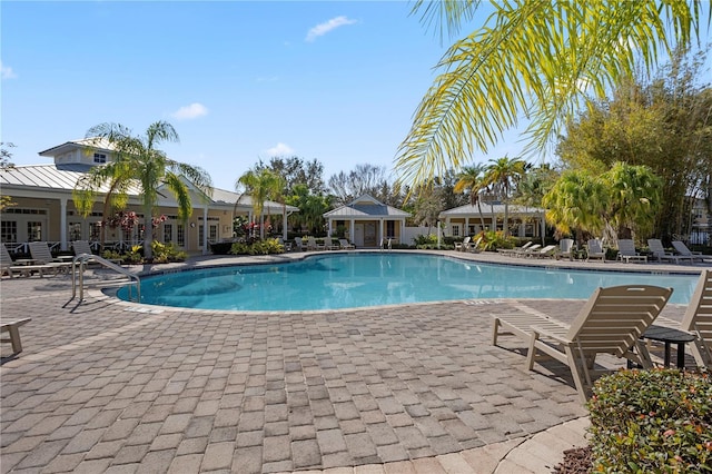 view of pool featuring a patio