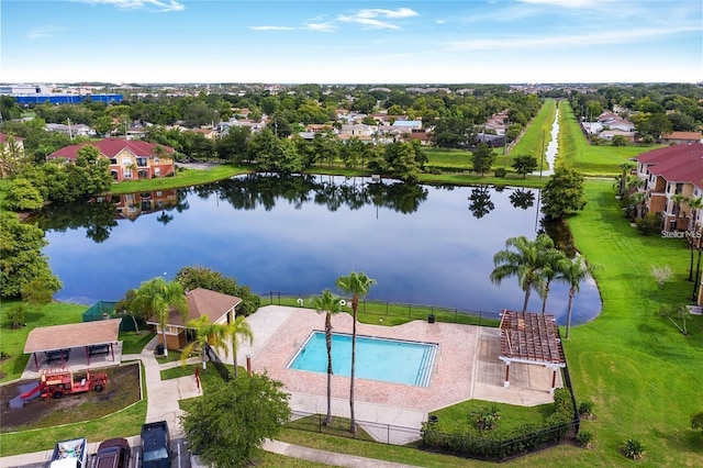 view of pool featuring a water view