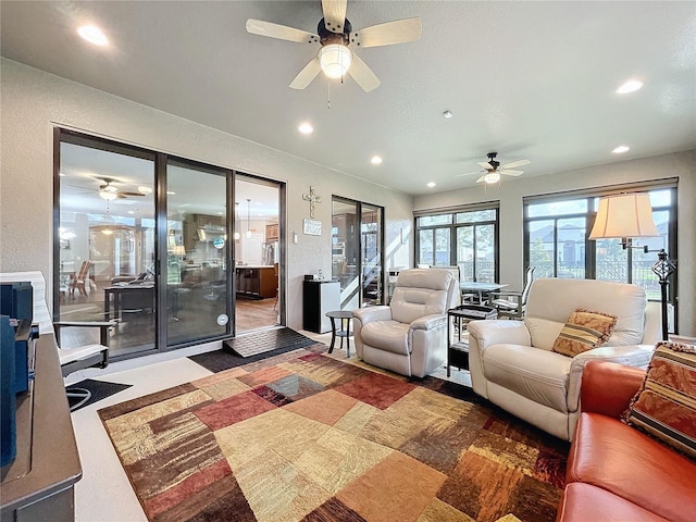 living room featuring ceiling fan