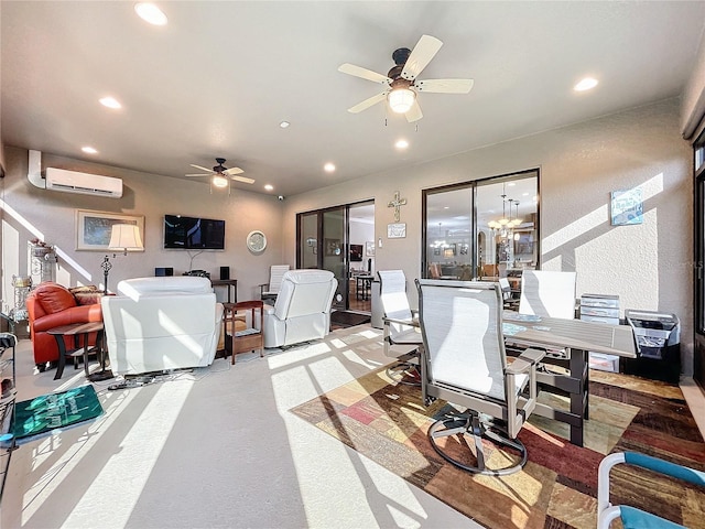 office area featuring ceiling fan with notable chandelier and an AC wall unit