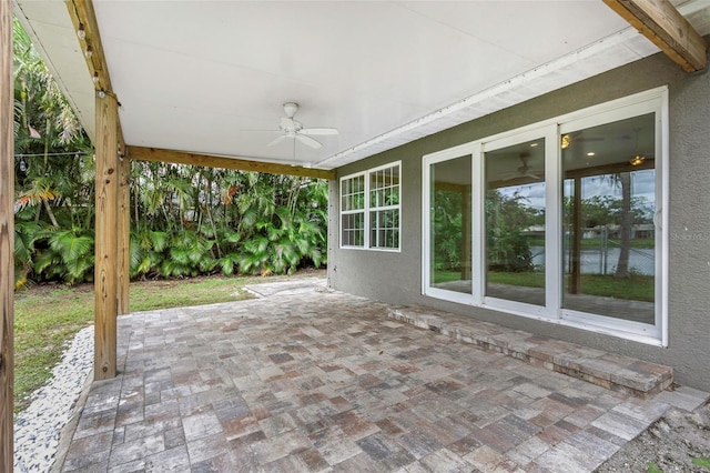 view of patio featuring ceiling fan