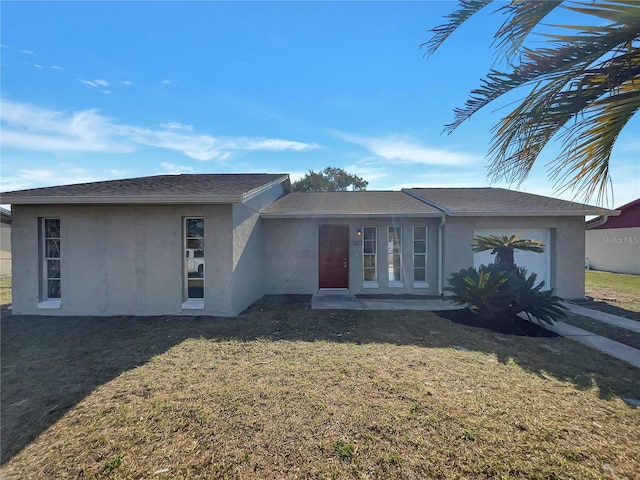 ranch-style house with a front yard