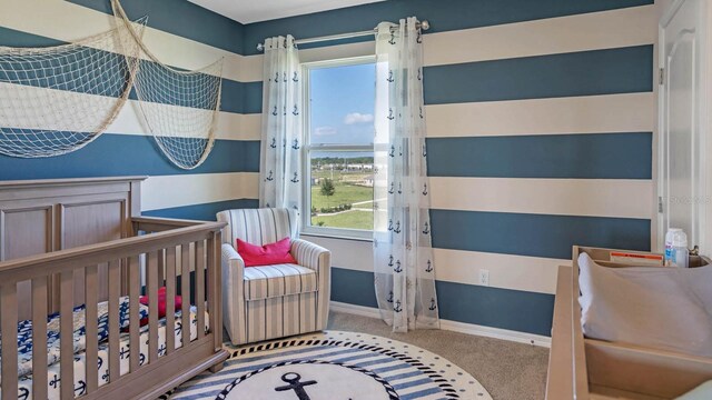 bedroom with light colored carpet