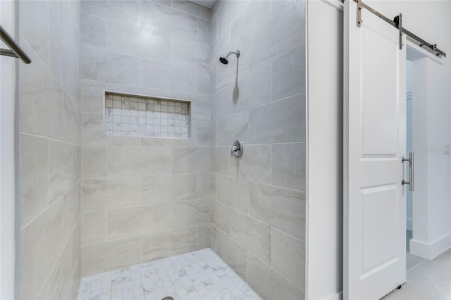 bathroom featuring tiled shower