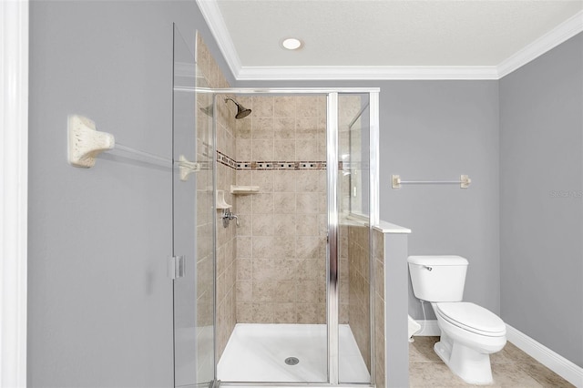 bathroom with crown molding, toilet, tile patterned flooring, and walk in shower