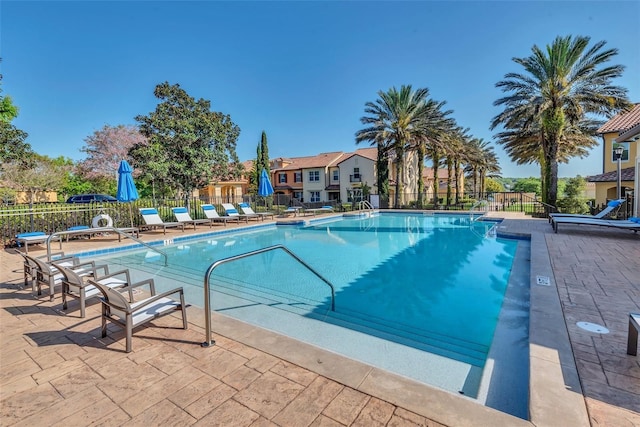 view of swimming pool with a patio area