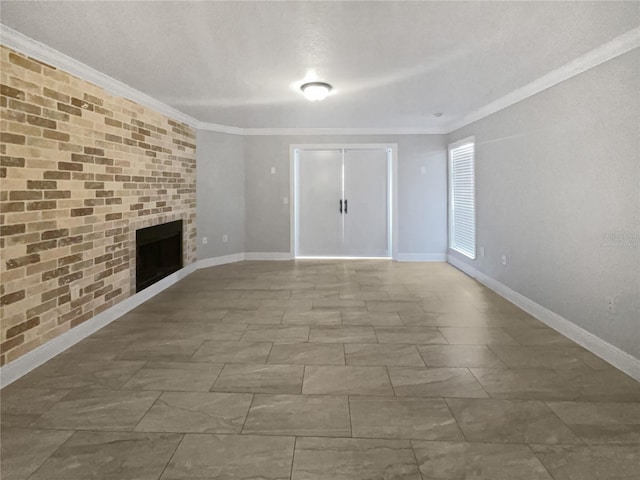 unfurnished living room featuring crown molding and a brick fireplace