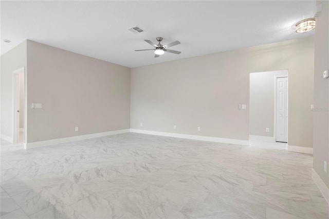 empty room featuring ceiling fan