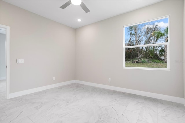 empty room featuring ceiling fan