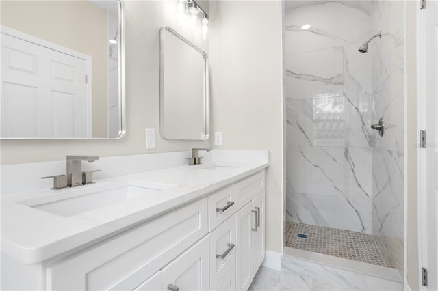 bathroom featuring vanity and a tile shower