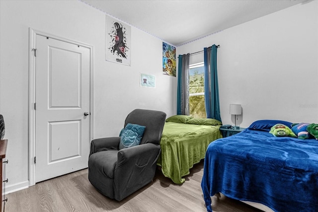 bedroom featuring light wood-type flooring