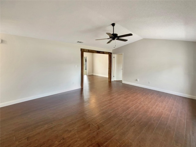 unfurnished room with dark wood-type flooring, ceiling fan, and lofted ceiling