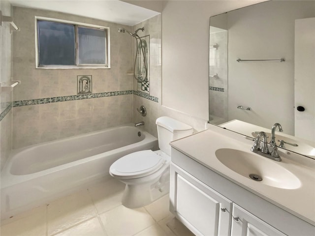 full bathroom with vanity, toilet, tiled shower / bath combo, and tile patterned flooring