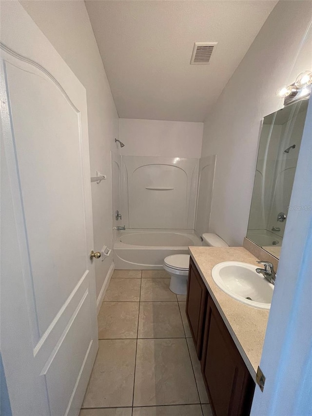 full bathroom featuring vanity, tile patterned flooring, shower / bathtub combination, and toilet